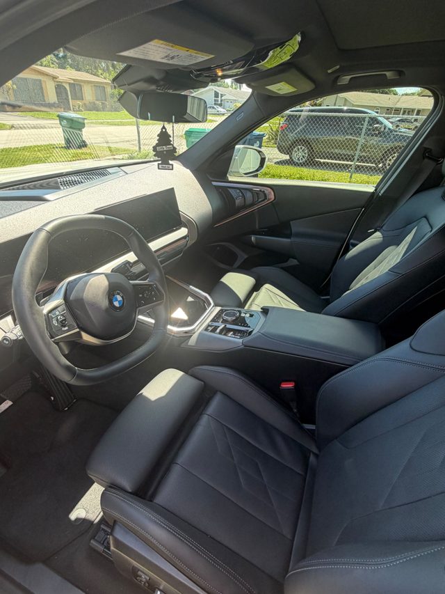 BMW X3 black leather front seats and dashboard